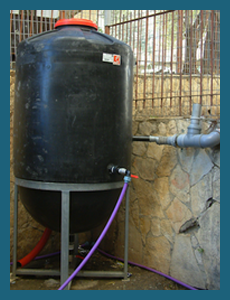 A rain barrel at Sur Baher Girls School